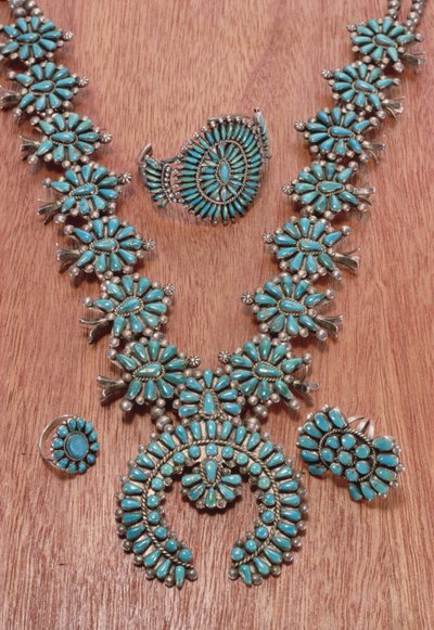Navajo necklace, bracelet and rings (silver and turquoise) by American School
